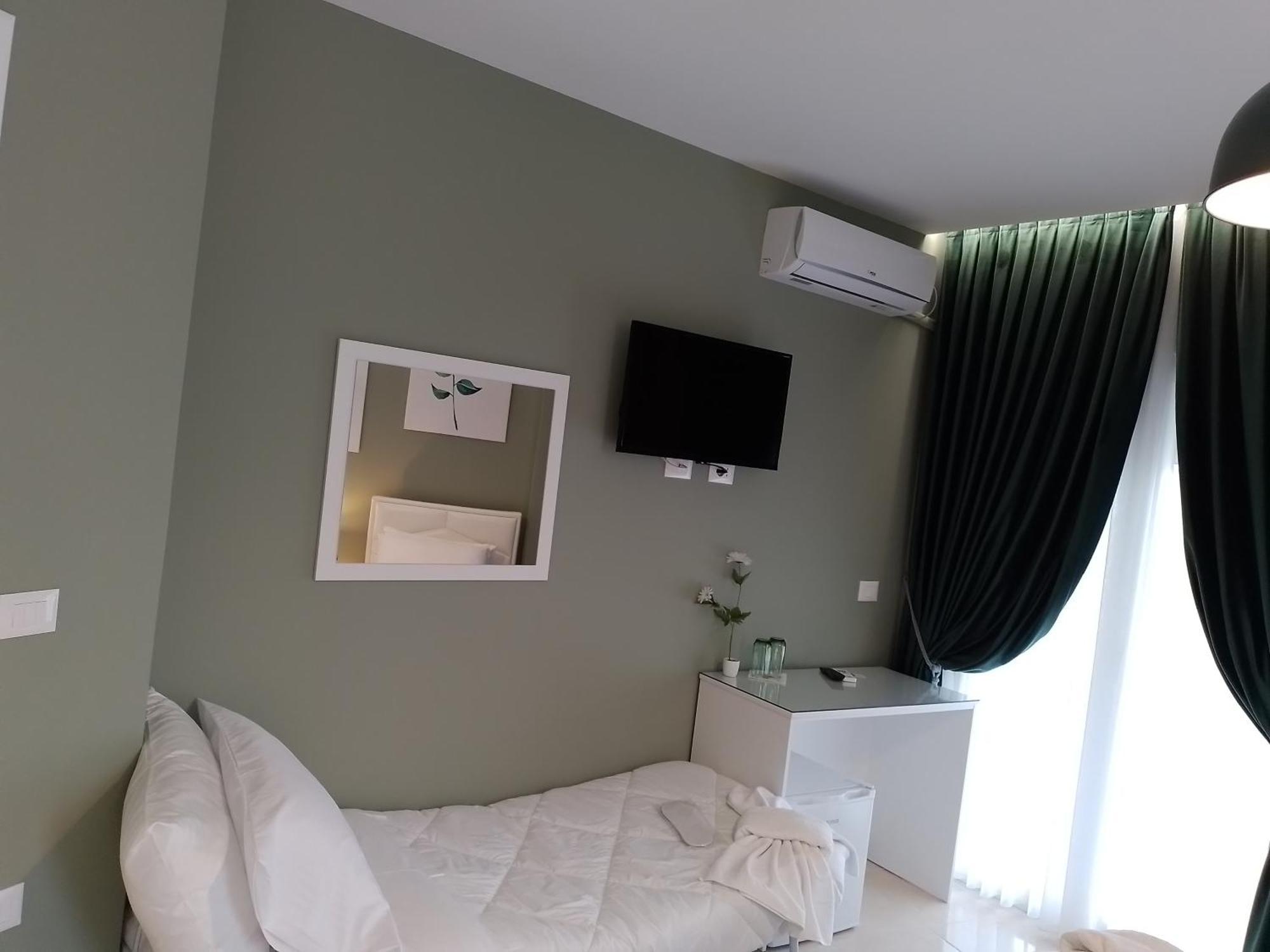Ajilin Hotel Rooms コルチャ 部屋 写真