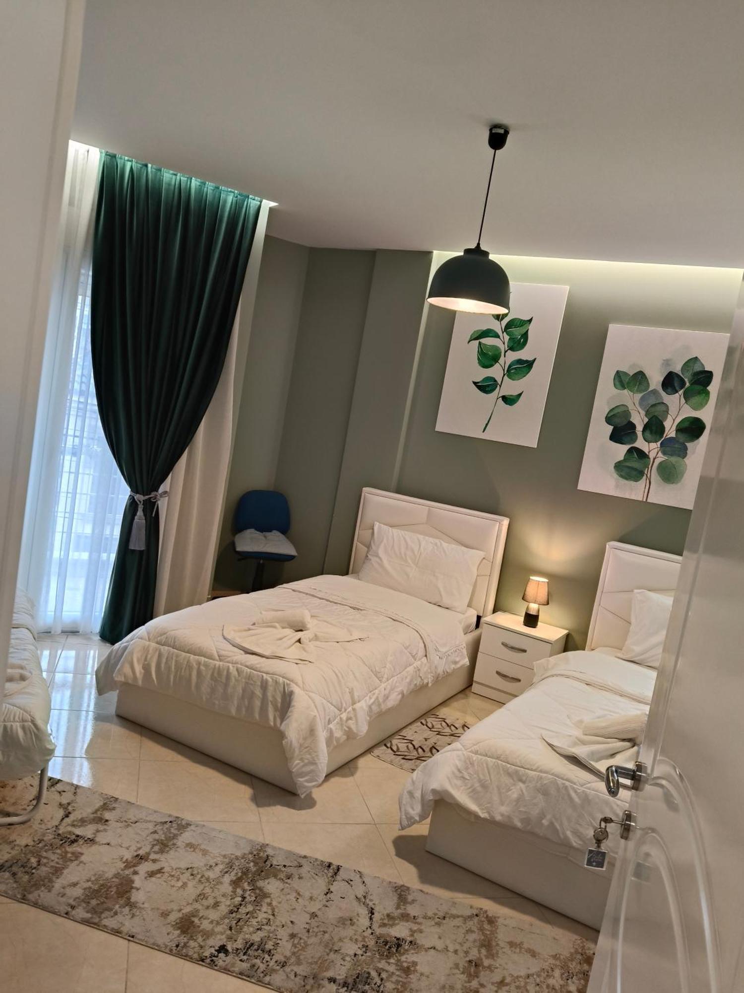 Ajilin Hotel Rooms コルチャ 部屋 写真