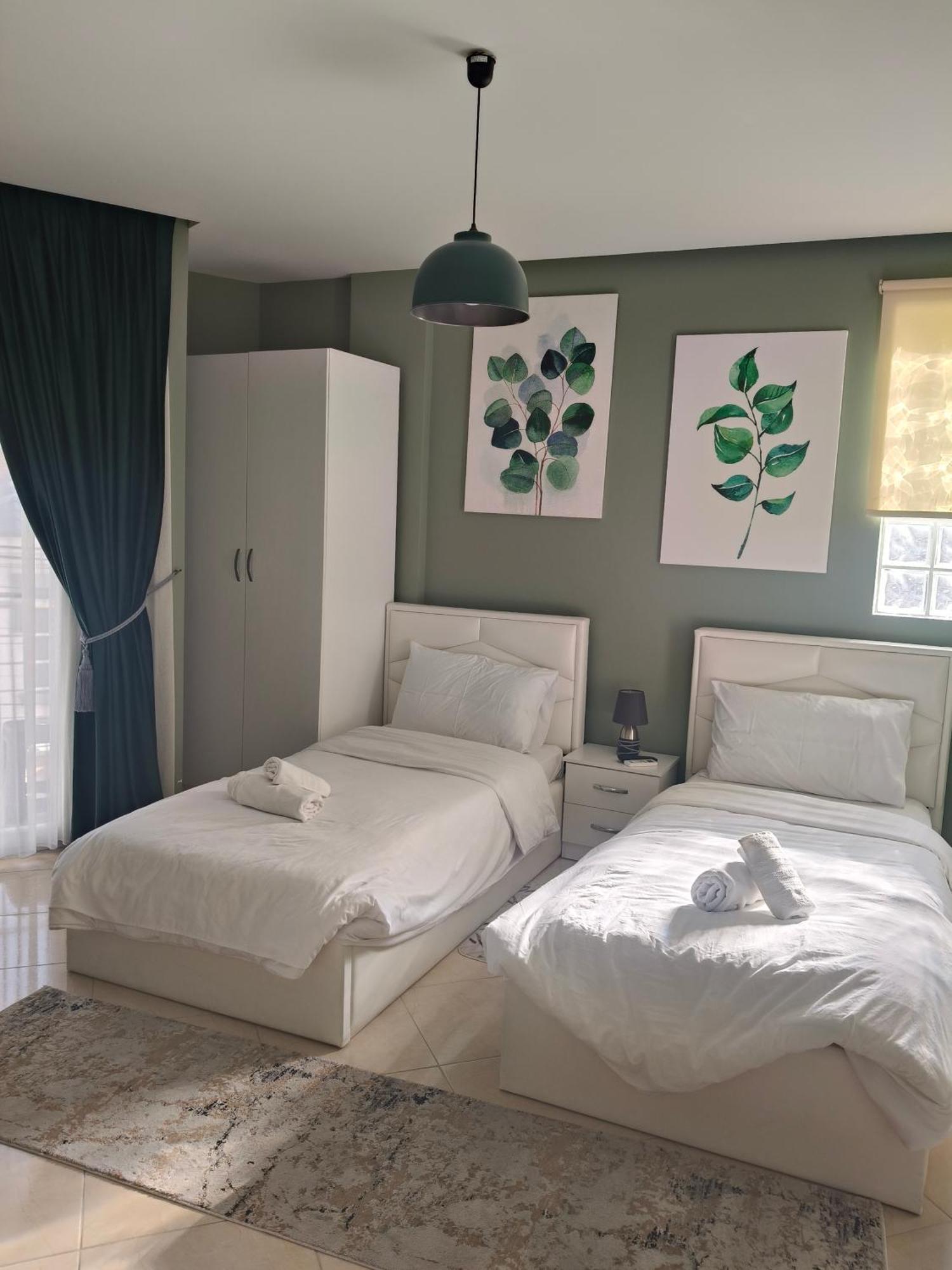 Ajilin Hotel Rooms コルチャ 部屋 写真